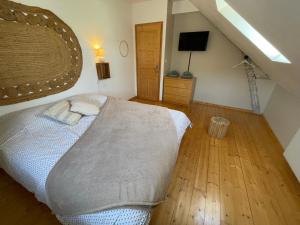 Maisons de vacances Gite Les Eaux du Moulin piscine chauffee et jacuzzi : photos des chambres