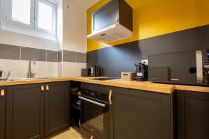 Appartements Tropical Escape near city center Fiber Netflix : photos des chambres