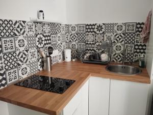 Appartements Studio sur cour, Centre-ville : photos des chambres