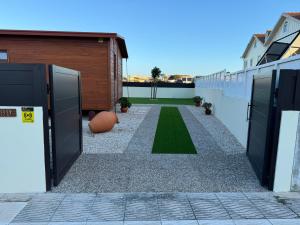 Acolhedora casa de férias T2 com espaço exterior