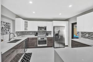 Family 5BR home w heated pool playground