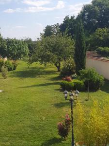 Appartements Au calme avec terrasse, clim et parking clos : photos des chambres