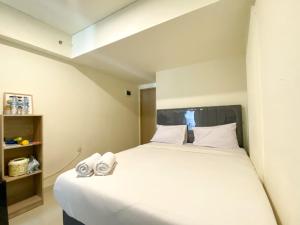 Simply Look and Enjoy Living Studio at Meikarta Apartment By Travelio