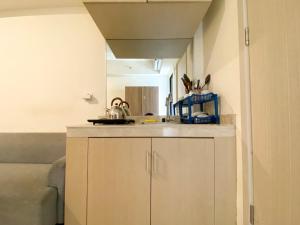 Simply Look and Enjoy Living Studio at Meikarta Apartment By Travelio