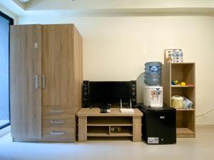 Simply Look and Enjoy Living Studio at Meikarta Apartment By Travelio