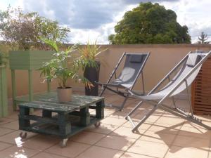 Appart avec terrasse, AirCon & parking clos