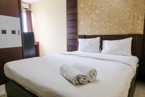 Homey 2BR at 21st Floor Galeri Ciumbuleuit 1 Apartment By Travelio