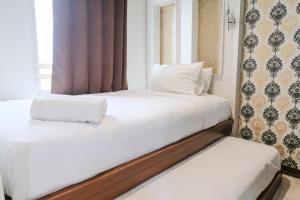 Homey 2BR at 21st Floor Galeri Ciumbuleuit 1 Apartment By Travelio