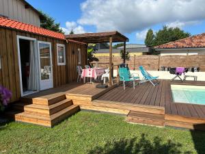 Chalets Chalet de jardin, piscine : photos des chambres