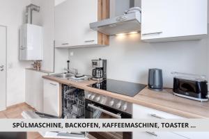NEU Easy Sleep - FeWo mit 3 Zimmern bis 6 Personen, 5 Einzelbetten oder 2 Doppelbetten und 1 Schlafcouch, Küche, Tageslichtbad - Monteure willkommen