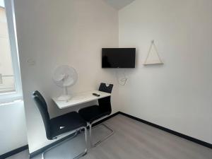 Appartements Studio B2 20m2 cosy 5min a pied des Gares : photos des chambres