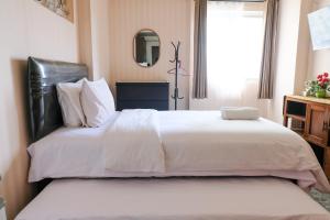 Homey and Cozy Studio Room at Suites @Metro Apartment By Travelio