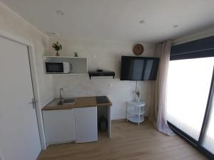 Appartements Studio contemporain avec parking gratuit : photos des chambres