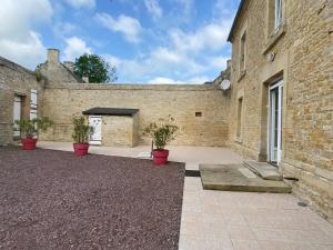 Maisons de vacances Le Camp Romain, maison familiale avec terrain : photos des chambres
