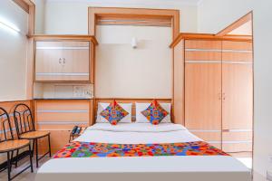 FabHotel ESS Paradise - Nr Bus stand