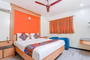 FabHotel ESS Paradise - Nr Bus stand