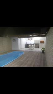 Casa com piscina próxima ao Mar