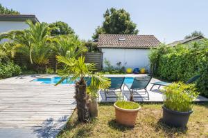 Villas Jolie Maison Landaise Avec Piscine : photos des chambres