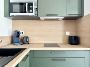 Appartements Le Safari - Neuf - Parking Prive - Calme - Wifi - Clim : photos des chambres
