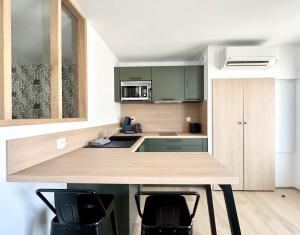 Appartements Le Safari - Neuf - Parking Prive - Calme - Wifi - Clim : photos des chambres