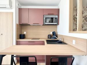 Appartements L-Ile Mystique - Central - Parking Prive - Neuf - Clim : photos des chambres