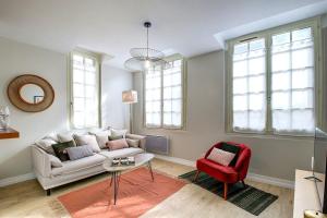 Appartements OIQIA • Harmonie : photos des chambres