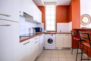 Appartements OIQIA • Harmonie : photos des chambres