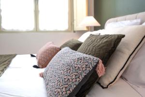 Appartements OIQIA • Harmonie : photos des chambres