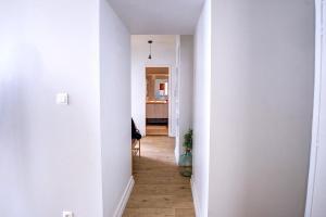 Appartements OIQIA • Harmonie : photos des chambres