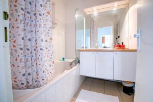 Appartements OIQIA • Harmonie : photos des chambres