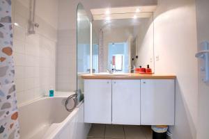 Appartements OIQIA • Harmonie : photos des chambres