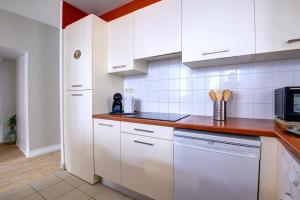 Appartements OIQIA • Harmonie : photos des chambres