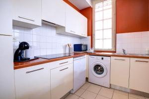Appartements OIQIA • Harmonie : photos des chambres