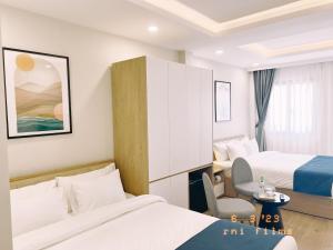 Phòng Hai Giường Đơn Loại Sang (Deluxe Twin Room)