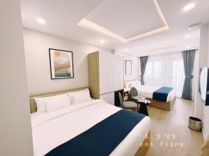 Phòng Hai Giường Đơn Loại Sang (Deluxe Twin Room)