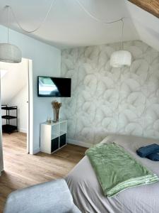 Appartements Suite Au grand air : photos des chambres