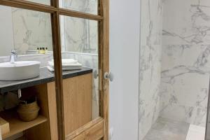 Appartements Home Chic Home - Les Suites de La Comedie : photos des chambres