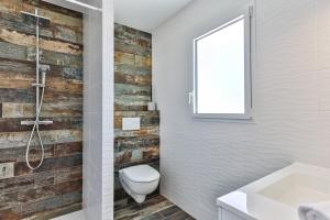 Maisons de vacances Agreable maison neuve avec spa : photos des chambres