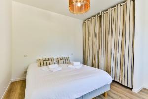 Maisons de vacances Agreable maison neuve avec spa : photos des chambres