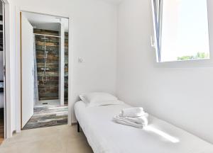 Maisons de vacances Agreable maison neuve avec spa : photos des chambres