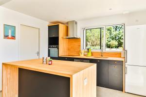 Maisons de vacances Agreable maison neuve avec spa : photos des chambres