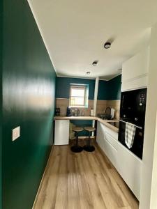 Appartements Le loft Emeraude : photos des chambres