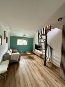 Appartements Le loft Emeraude : photos des chambres
