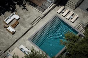 Bozonos Villa - Beachfront Simplicity with Heated Pool