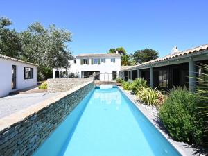Maisons de vacances Maison spacieuse avec piscine et acces plage - FR-1-434-69 : photos des chambres