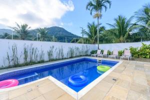 Casa de alto padrão, com 5 suítes, a 50m praia de Barequeçaba