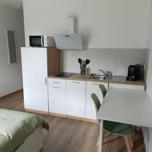 Appart'hotels L-Escale Chatillonnaise - L-Explorateur : photos des chambres
