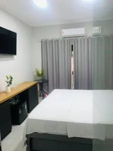 Suíte confortável no centro - Cássia