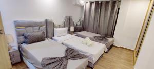 Un élégant duplex au coeur de Marrakech avec deux piscines et un espace vert