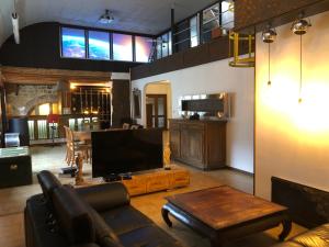 Appartements APPARTEMENT style loft industrielle de 250m2 : photos des chambres